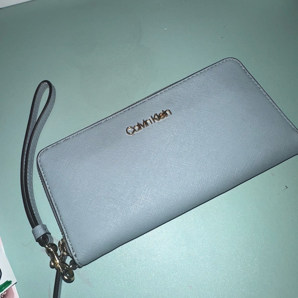 Calvin Klein Light Blue Wristlet Wallet with Gold Logo